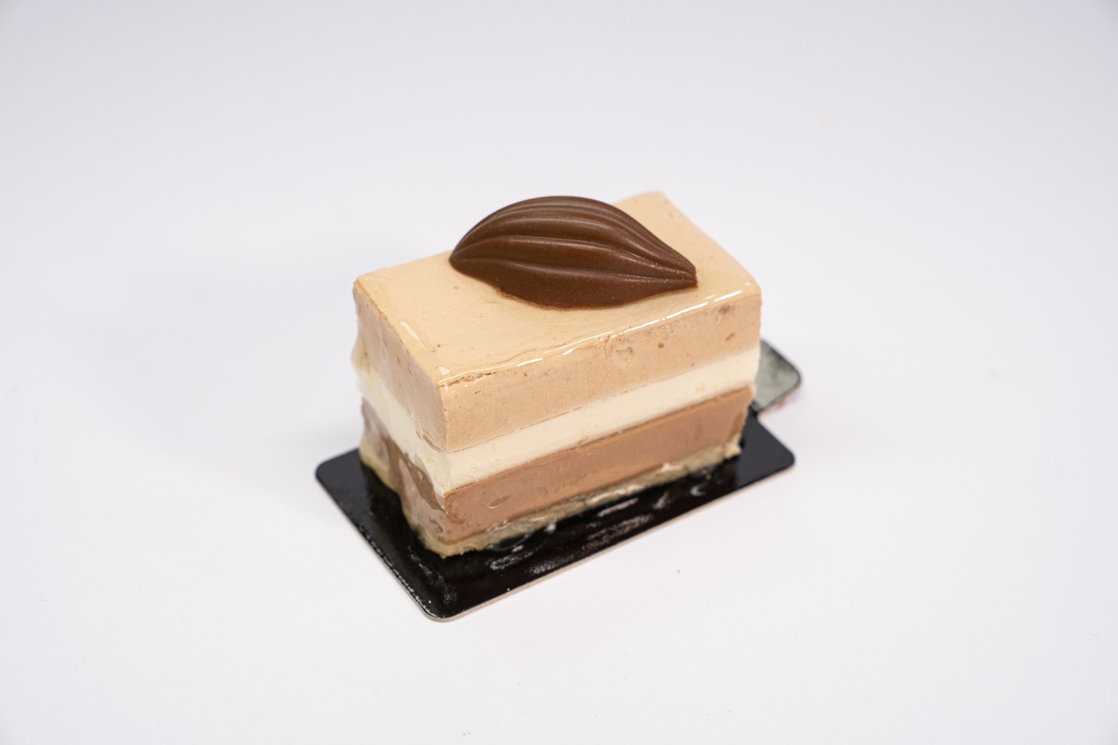 Pastel mousse tres chocolates