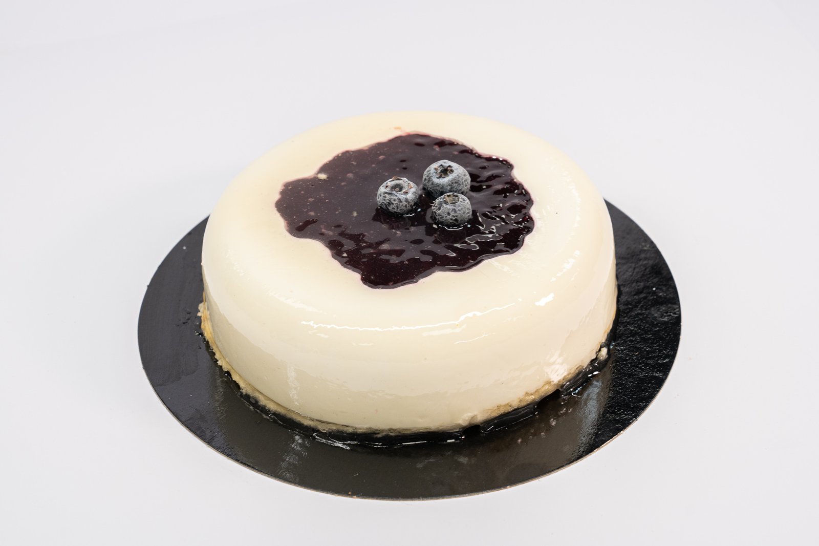 Tarta mousse de queso y mermelada de arándanos