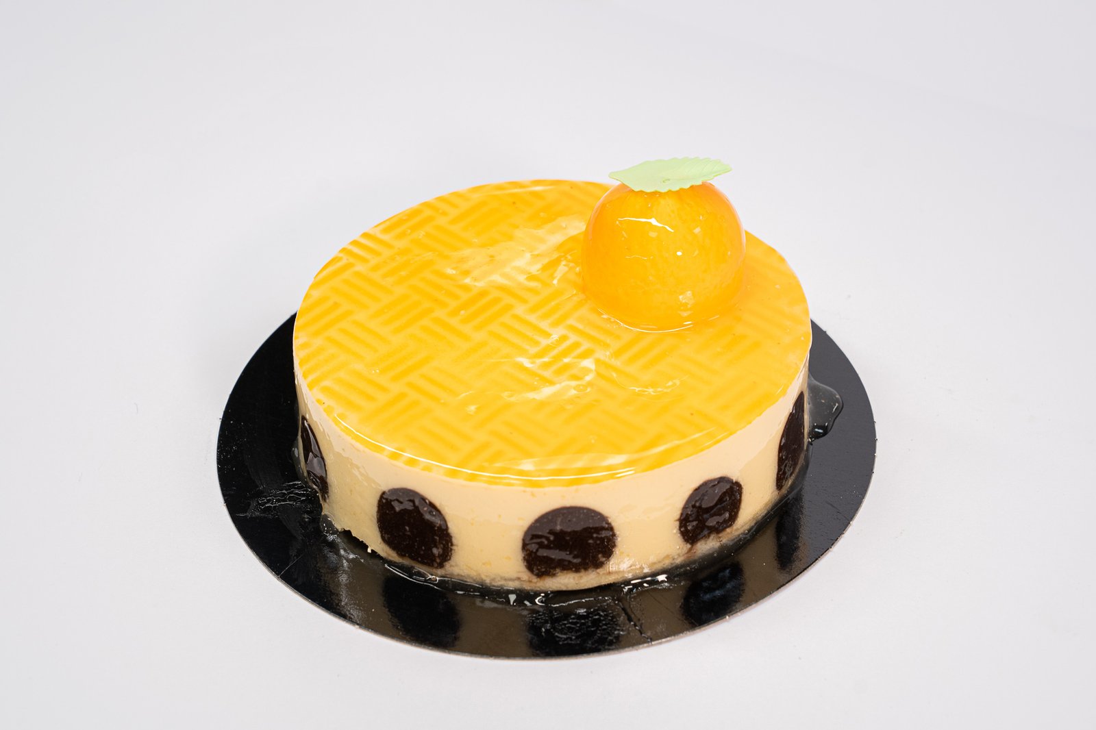 Tarta mousse de naranja y trufa cocida